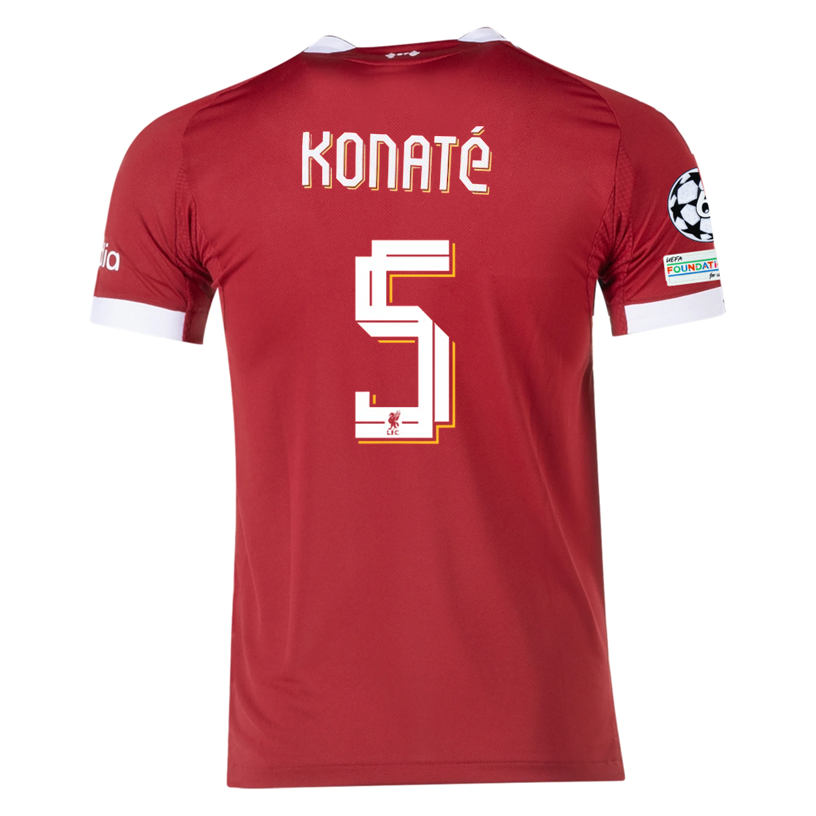 adidas Men's Liverpool FC Authentic Konate Home Jersey 25/26 w/ Champions League Patches (Strawberry Red)